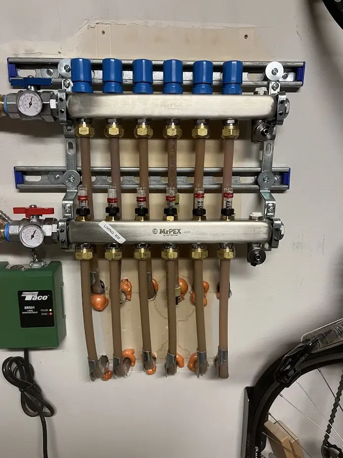 Plumber performing Gas Leak Detection at a residential property in Ames